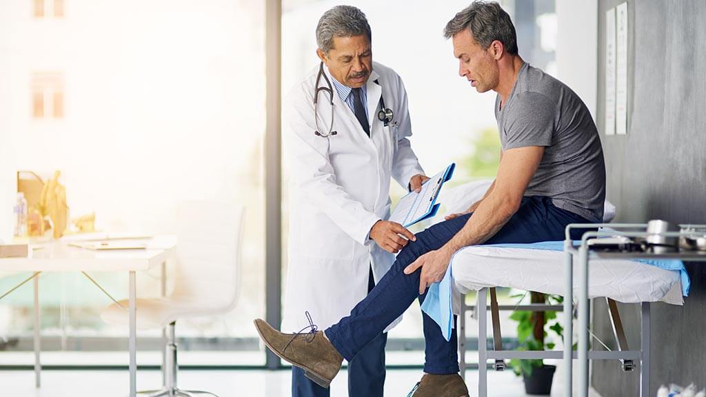 doctor in joint consultation with patient